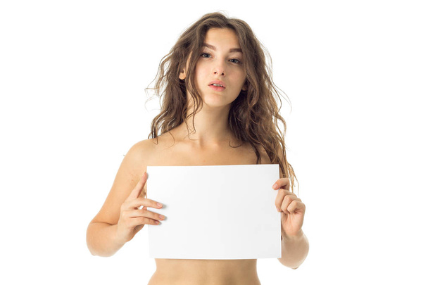 nude brunette girl with placard - Foto, Imagem