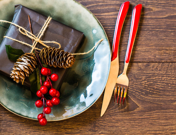 Rustic table setting for Christmas eve  - Foto, afbeelding