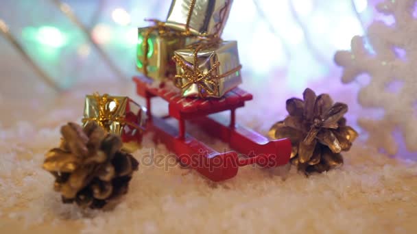 cajas con regalos en el trineo de juguete rojo Fondo de Navidad
 - Imágenes, Vídeo