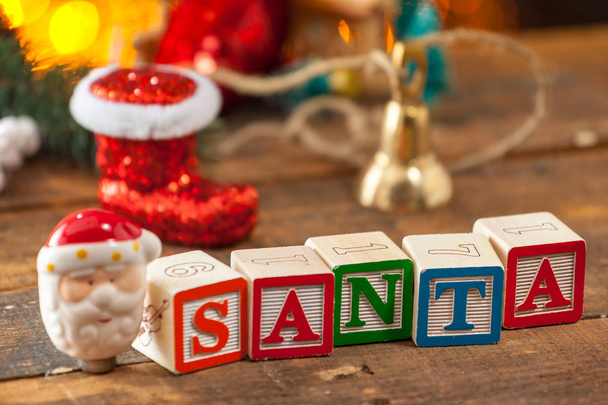Santa Written With Toy Blocks On Christmas Card Background. - Foto, immagini
