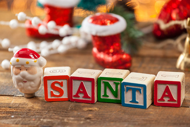 Santa Written With Toy Blocks On Christmas Card Background. - Foto, immagini