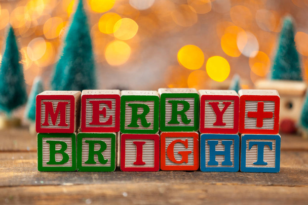 Merry And Bright Written With Toy Blocks On Christmas Card - Foto, imagen