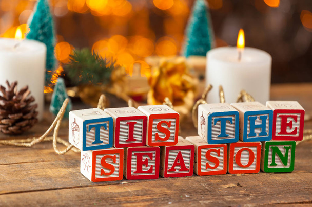 Tis The Season Written With Toy Blocks On Christmas Card Background - Photo, image