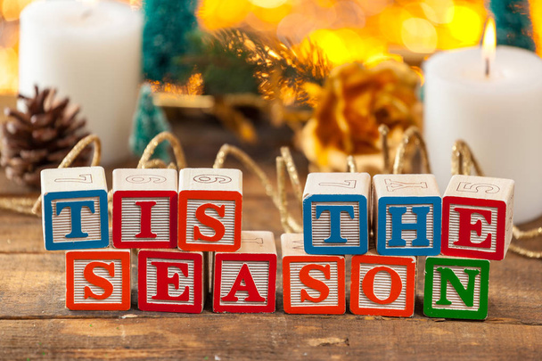 Tis The Season Written With Toy Blocks On Christmas Card Background - Photo, image
