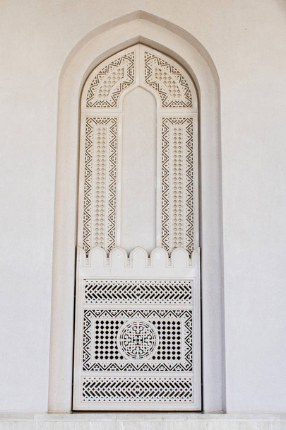 oman old ornate window pattern at mosque Qaboos - Photo, Image