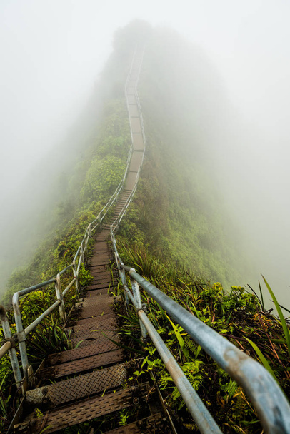 Stairway to Heaven in Oahu island Hawaii coverd by morning fog - Photo, Image