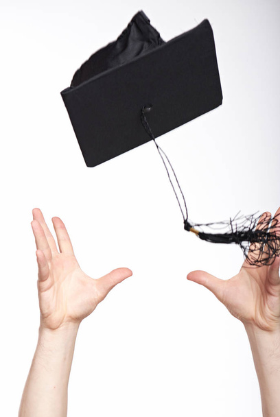 catching graduation hat in air - Photo, Image