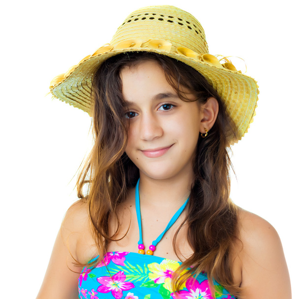 Hispanic girl wearing a swimsuit and a straw hat - Fotografie, Obrázek
