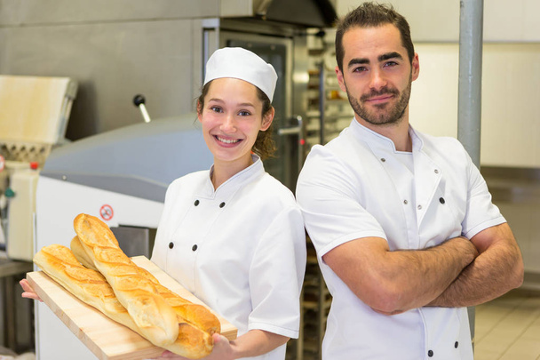 bakers working at the bakery - Foto, Bild