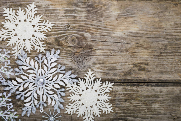 Christmas ornaments on the wooden background.   - Φωτογραφία, εικόνα