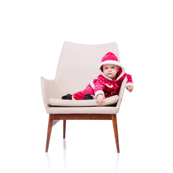 Cute little Santa posing against white background - Fotoğraf, Görsel