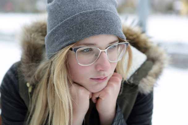 Portrait of thinking girl in glasses - Zdjęcie, obraz