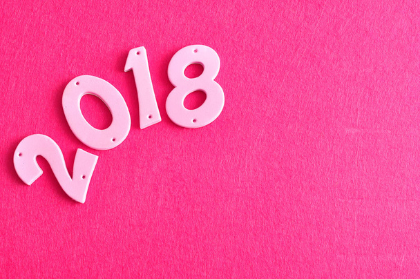 2018 in rosa Zahlen vor rosa Hintergrund - Foto, Bild