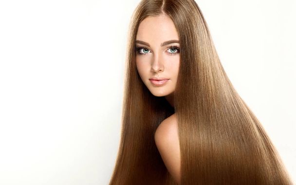  дівчина з коричневим довгим прямим волоссям
  - Фото, зображення