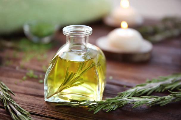 Bottle of rosemary essential oil - Foto, immagini