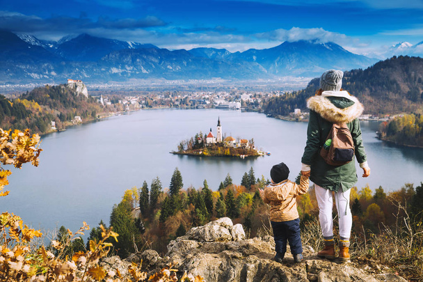 Traveling family looking on Bled Lake, Slovenia, Europe  - Foto, immagini