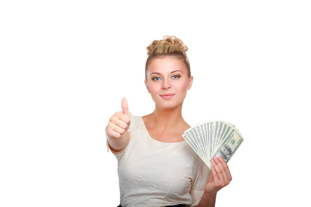 Young woman with dollar notes in her hand. Isolated on white background - Foto, imagen
