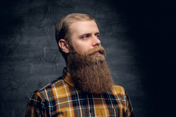 Hipster man dressed in a plaid shirt - Photo, Image