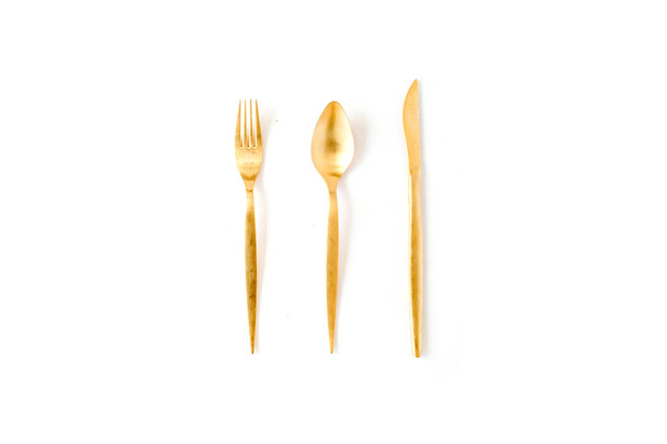 Golden fork, spoon, knife - 写真・画像