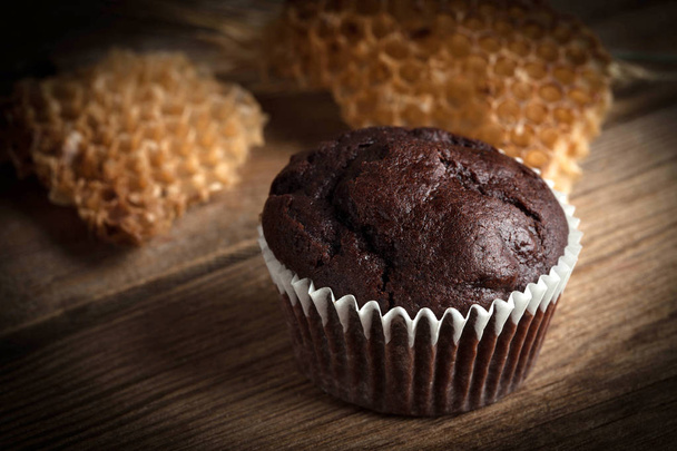 Chocolate muffin on dark background. - Fotografie, Obrázek