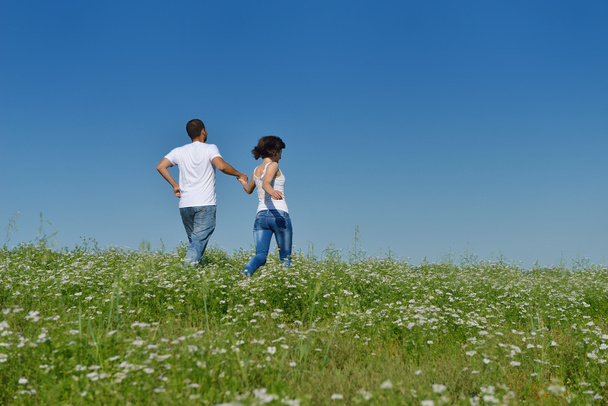 happy couple in wheat field - Photo, Image