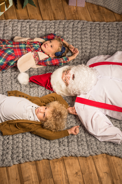 Happy Santa Claus with children  - Fotografie, Obrázek