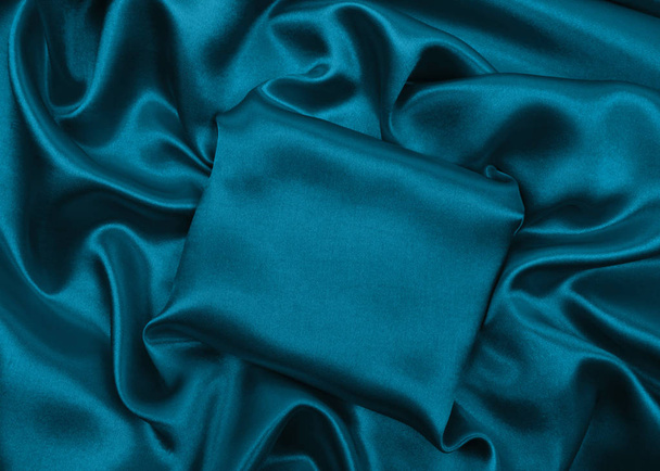 Smooth elegant blue silk or satin luxury cloth texture as abstra - Фото, изображение