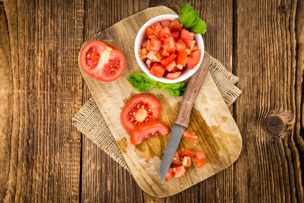 Diced Tomatoes on a vintage background - Foto, Bild
