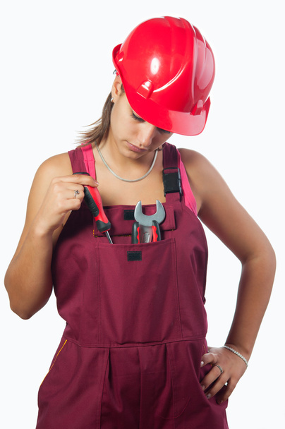 Woman mechanic with hard hat and in overalls isolated on white - Foto, Imagen