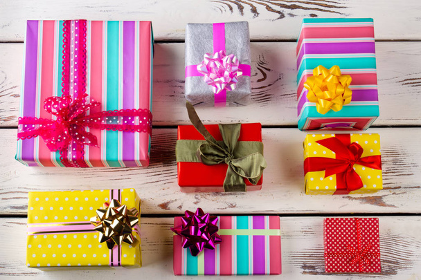 Many colorful Christmas gifts. - 写真・画像