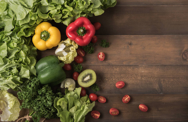 vegetables and fruit on wood background - Photo, Image