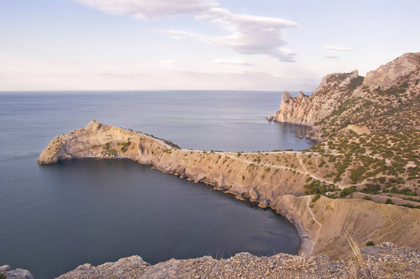 Popular rocky headland without any plants during hot summer season - Photo, Image