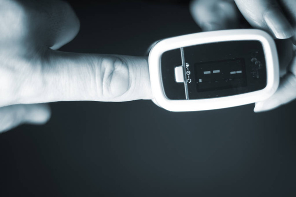Cardiac mini finger pulse meter - Photo, Image