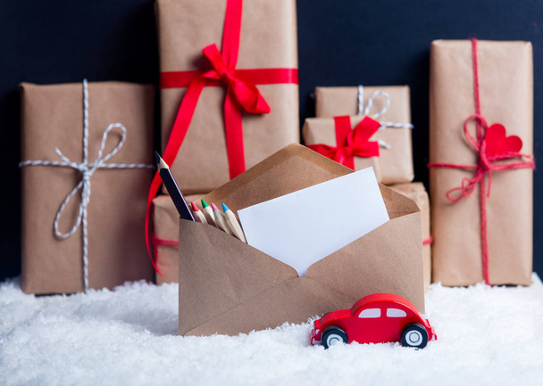 Christmas gifts and envelope - Fotografie, Obrázek