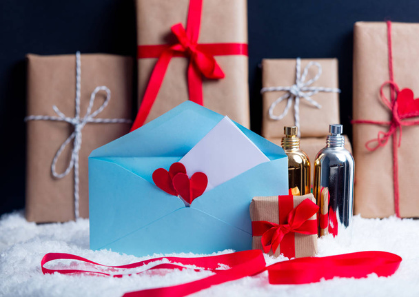 Gift boxes and perfume with envelope - Photo, Image