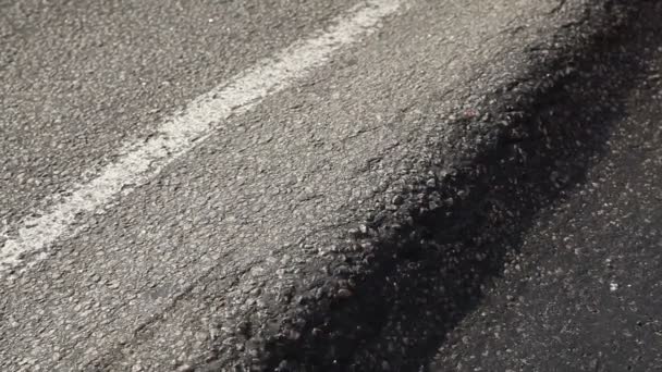 the uneven surface of the road - Footage, Video