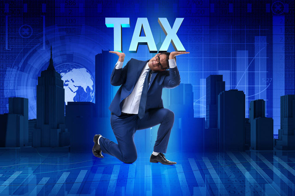 Muž pod břemeno daňových plateb - Fotografie, Obrázek