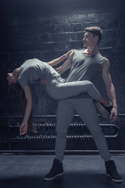Talented dancers performing in close interaction with each other - Foto, Bild