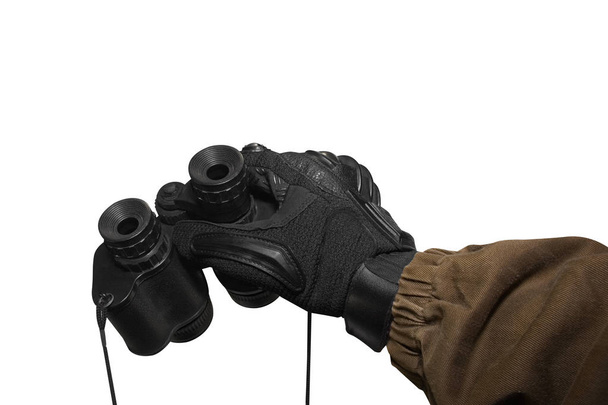 Isolated soldier arm holding binoculars. - Photo, Image