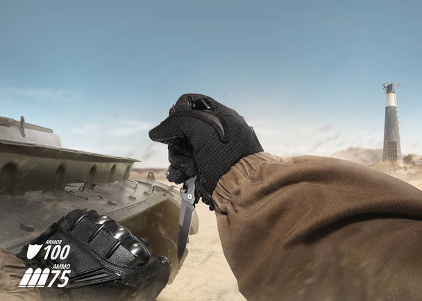First person view soldier arm holding tactical knife. - Photo, Image