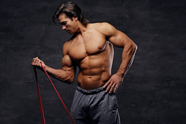 Athletic man with fitness trx straps - Photo, Image