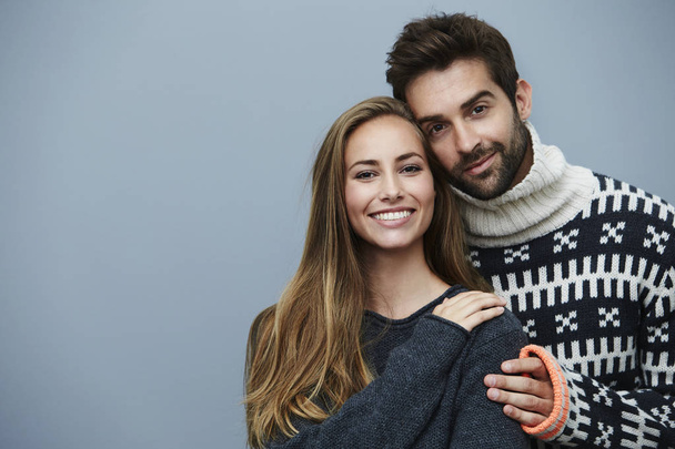 Affectionate couple in knitwear - Foto, Imagen