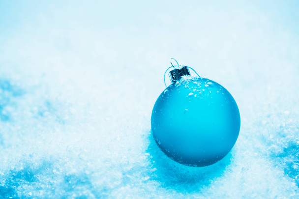 Round Blue Christmas balls on the snow new cold - Valokuva, kuva