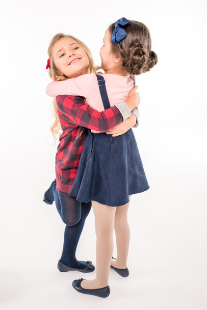 Happy schoolgirls hugging  - Photo, Image