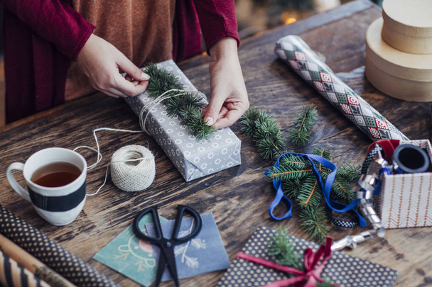 Woman Wrapping Christmas Presents - Fotó, kép