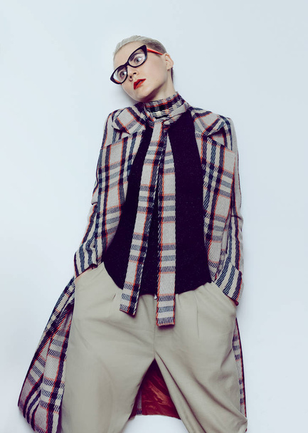 Vintage Fashion Lady's checkered coat. Checkered Trend Fall Wint - Zdjęcie, obraz