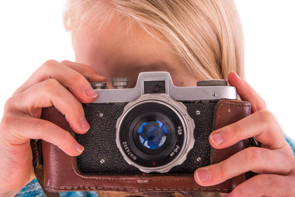 teen girl with retro camera on a white background  - Photo, Image