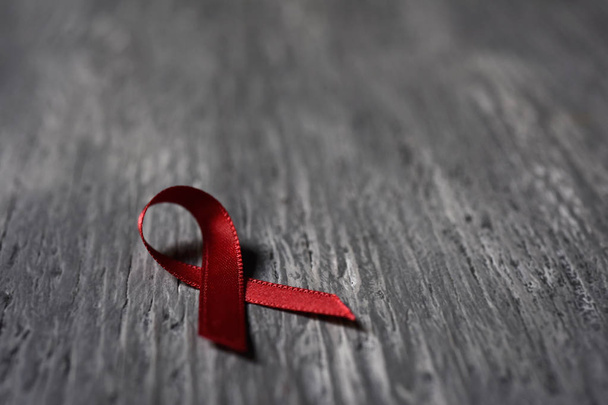 red ribbon for the fight against AIDS - Foto, immagini
