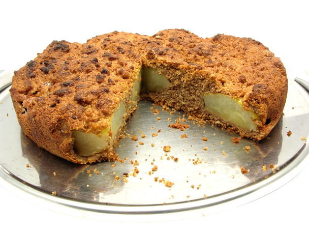 Kepekli armut pasta kek üzerine dilimlenmiş pl - Fotoğraf, Görsel