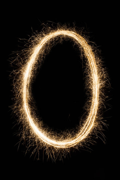 Letra o número nulo O del alfabeto sparklers en negro
 - Foto, imagen